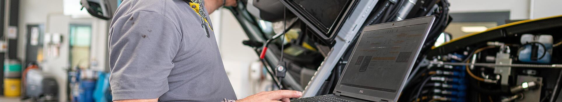 wacker neuson employee checks machine